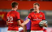 25 September 2021; Mike Haley, right, and Ben Healy of Munster celebrate their side's fifth try, scored by team-mate Chris Cloete, during the United Rugby Championship match between Munster and Cell C Sharks at Thomond Park in Limerick. Photo by Seb Daly/Sportsfile