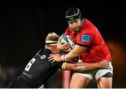 25 September 2021; Jeremy Loughman of Munster is tackled by Dylan Richardson of Cell C Sharks during the United Rugby Championship match between Munster and Cell C Sharks at Thomond Park in Limerick. Photo by Seb Daly/Sportsfile