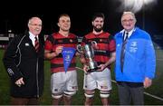 1 October 2021; Dublin University FC captain Aaron Coleman, second from left, and team-mate Darragh O'Callaghan, alongside Dublin University chairman John Boyd, left, and Leinster Rugby president John Walsh after the Metropolitan Cup Final match between Dublin University FC and Terenure College at Energia Park in Dublin. Photo by Ben McShane/Sportsfile