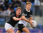 7 October 2021; Ciarán Mangan of Newbridge College is tackled by Caiden McLoughlin of Belvedere College during the Bank of Ireland Leinster Schools Junior Cup Round 2 match between Newbridge College and Belvedere College at Energia Park in Dublin. Photo by Harry Murphy/Sportsfile