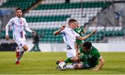 8 October 2021; Liam Kerrigan of Republic of Ireland is fouled by Franz Sinner of Luxembourg resulting in a penalty during the UEFA European U21 Championship Qualifier match between Republic of Ireland and Luxembourg at Tallaght Stadium in Dublin.  Photo by Sam Barnes/Sportsfile