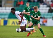 8 October 2021; Dylan Kuete of Luxembourg is tackled by Joel Bagan of Republic of Ireland during the UEFA European U21 Championship Qualifier match between Republic of Ireland and Luxembourg at Tallaght Stadium in Dublin.  Photo by Sam Barnes/Sportsfile