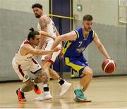 9 October 2021; Graham Branelly of DCU St. Vincent’s in action against Lorcan Murphy of Griffith College Templeogue during the InsureMyVan.ie Men's Super League North Conference match between DCU St Vincent's and Griffith College Templeogue at DCU Sports Complex in Dublin. Photo by Daniel Tutty/Sportsfile