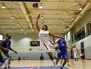 9 October 2021; Kris Arcilla of Griffith College Templeogue scores a lay up during the InsureMyVan.ie Men's Super League North Conference match between DCU St Vincent's and Griffith College Templeogue at DCU Sports Complex in Dublin. Photo by Daniel Tutty/Sportsfile