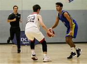 9 October 2021; Donal Monaghan of DCU St. Vincent's in action against Daire Murphy of Griffith College Templeogue during the InsureMyVan.ie Men's Super League North Conference match between DCU St Vincent's and Griffith College Templeogue at DCU Sports Complex in Dublin. Photo by Daniel Tutty/Sportsfile