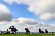 10 October 2021; A general view as Tartan Skirt, with Leigh Roche up, left, cross the line to win the Irish EBF Median Sires Series Maiden at The Curragh Racecourse in Kildare. Photo by Harry Murphy/Sportsfile