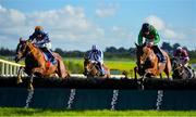 10 October 2021; Kruzhlinin, left, with Jordan Gainfords up, jumps the last on their way to winning the David Fitzgerald Memorial Handicap Hurdle, from second place Buck Rogers, right, with Brian Hayes up, at Limerick Racecourse in Patrickswell, Limerick. Photo by Seb Daly/Sportsfile