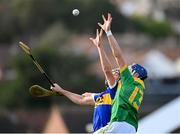 10 October 2021; Chrissy McMahon of Dunloy in action against Gerard Walsh of O'Donovan Rossa during the Antrim County Senior Club Hurling Championship Final match between Dunloy and O'Donovan Rossa at Corrigan Park in Belfast. Photo by Ramsey Cardy/Sportsfile