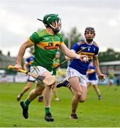 10 October 2021; Kevin Molloy of Dunloy in action against Gerard Walsh of O'Donovan Rossa during the Antrim County Senior Club Hurling Championship Final match between Dunloy and O'Donovan Rossa at Corrigan Park in Belfast. Photo by Ramsey Cardy/Sportsfile