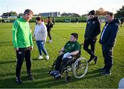 11 October 2021; Republic of Ireland manager Stephen Kenny with Liam Mooney and his family, from Malin Head, Donegal, during a Republic of Ireland training session at the FAI National Training Centre in Abbotstown, Dublin. Liam got the opportunity to meet the Republic of Ireland team after the Make-A-Wish granted his wish to meet the Republic of Ireland team. Make-A-Wish is a Children's Charity which grants the wishes of children with life-threatening medical conditions to give hope, strength and joy. Photo by Stephen McCarthy/Sportsfile