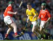 17 March 2004; Liam Richmond, Dunloy, in action against Philip Noonan, left, and Jerry O'Connor, Newtownshandrum. AIB All-Ireland Club Hurling Final, Newtownshandrum v Dunloy, Croke Park, Dublin, Picture credit; Brendan Moran / SPORTSFILE   *EDI*