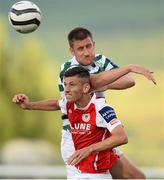 23 July 2013; Peter Durrad, St. Patrick's Athletic, in action against Jason McGuinness, Shamrock Rovers. EA Sports Quarter-Final, Shamrock Rovers v St. Patrick's Athletic, Tallaght Stadium, Tallaght, Dublin. Picture credit: David Maher / SPORTSFILE