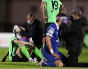 15 October 2021; Johnny Dunleavy of Finn Harps receives attention following a clash with Greg Halford of Waterford  during the SSE Airtricity League Premier Division match between Waterford and Finn Harps at the RSC in Waterford. Photo by Michael P Ryan/Sportsfile