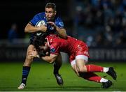 16 October 2021; Jordan Larmour of Leinster is tackled by Ryan Conbeer of Scarlets during the United Rugby Championship match between Leinster and Scarlets at the RDS Arena in Dublin. Photo by Harry Murphy/Sportsfile
