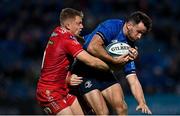 16 October 2021; Hugo Keenan of Leinster is tackled by Sam Costelow of Scarlets during the United Rugby Championship match between Leinster and Scarlets at the RDS Arena in Dublin. Photo by Seb Daly/Sportsfile