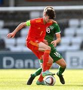 19 October 2021; Charlie Crew of Wales in action against Taylor Mooney of Republic of Ireland during the Victory Shield match between Wales and Republic of Ireland at Seaview in Belfast. Photo by Ramsey Cardy/Sportsfile