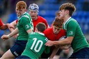 28 October 2021; Jamie Byrne of North East is tackled by Peter Burgess, left, and Tom Stokes of South East during the Shane Horgan Cup Third Round match between South East and North East at Energia Park in Dublin. Photo by Brendan Moran/Sportsfile