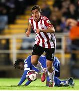 2 November 2021; Joe Thompson of Derry City in action against Junior Quitirna of Waterford during the SSE Airtricity League Premier Division match between Waterford and Derry City at RSC in Waterford. Photo by Michael P Ryan/Sportsfile