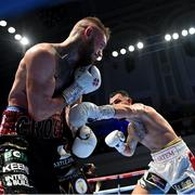 5 November 2021; Lewis Crocker, left, and Artem Haroyan during their WBO European welterweight title boutat the Ulster Hall in Belfast. Photo by Ramsey Cardy/Sportsfile