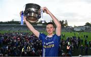 7 November 2021; Shane Carey of Scotstown lifts the Mick Duffy cup after the Monaghan County Senior Club Football Championship Final match between Scotstown and Truagh at St Tiernachs Park in Clones, Monaghan. Photo by Philip Fitzpatrick/Sportsfile