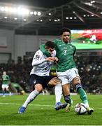 15 November 2021; Jamal Lewis of Northern Ireland in action against Giovanni Di Lorenzo of Italy during the FIFA World Cup 2022 Qualifier match between Northern Ireland and Italy at the National Football Stadium at Windsor Park in Belfast. Photo by David Fitzgerald/Sportsfile