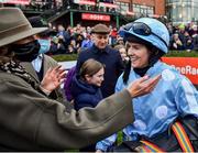 28 November 2021; Rachael Blackmore is embraced by Caroline Alexander, wife of owner Kenneth Alexander, after winning the BARONERACING.COM Hatton's Grace Hurdle on Honeysuckle during day two of the Fairyhouse Winter Festival at Fairyhouse Racecourse in Ratoath, Meath. Photo by David Fitzgerald/Sportsfile