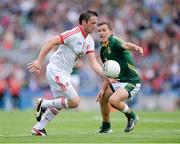 27 July 2013; Martin Penrose, Tyrone, in action against Seamus Kenny, Meath. GAA Football All-Ireland Senior Championship, Round 4, Meath v Tyrone, Croke Park, Dublin. Picture credit: Stephen McCarthy / SPORTSFILE