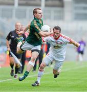 27 July 2013; Eamonn Wallace, Meath, in action against Martin Penrose, Tyrone. GAA Football All-Ireland Senior Championship, Round 4, Meath v Tyrone, Croke Park, Dublin. Picture credit: David Maher / SPORTSFILE