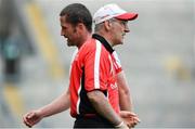 27 July 2013; Stephen O'Neill, Tyrone, walks past manager Mickey Harte, after been sent off by referee Maurice Deegan. GAA Football All-Ireland Senior Championship, Round 4, Meath v Tyrone, Croke Park, Dublin. Picture credit: David Maher / SPORTSFILE