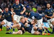 11 December 2021; Andrew Porter of Leinster is tackled by Josh McNally of Bath during the Heineken Champions Cup Pool A match between Leinster and Bath at Aviva Stadium in Dublin. Photo by Brendan Moran/Sportsfile