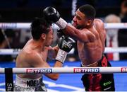 11 December 2021; Caoimhin Agyarko, right, and Noe Larios Jr during their vacant WBA International Middleweight Title bout at M&S Bank Arena in Liverpool, England. Photo by Stephen McCarthy/Sportsfile