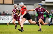 12 December 2021; Katie Gallagher of Oulart the Ballagh in action against Clare McGrath and Ceat McEldowney of Slaughtneil during the 2020 AIB All-Ireland Senior Club Camogie Championship Semi-Final match between Slaughtneil and Oulart the Ballagh at Donaghmore Ashbourne GAA in Ashbourne, Meath. Photo by Matt Browne/Sportsfile