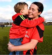 12 December 2021; Oulart the Ballagh captain Mary Leacy geta a kiss from her 3 year old son Jake after the 2020 AIB All-Ireland Senior Club Camogie Championship Semi-Final match between Slaughtneil and Oulart the Ballagh at Donaghmore Ashbourne GAA in Ashbourne, Meath. Photo by Matt Browne/Sportsfile