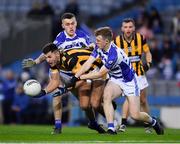 18 December 2021; Glen Malone of Shelmaliers in action against Conor McCarthy, left, and Brian Byrne of Naas during the AIB Leinster GAA Football Senior Club Championship Semi-Final match between Shelmaliers and Naas at Croke Park in Dublin. Photo by Ray McManus/Sportsfile