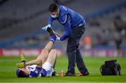 18 December 2021; Conor McCarthy of Naas is attended to by physiotherapist Stephen Sheaf during extra time in the AIB Leinster GAA Football Senior Club Championship Semi-Final match between Shelmaliers and Naas at Croke Park in Dublin. Photo by Ray McManus/Sportsfile
