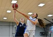 9 January 2022; Illanna Fitzgerald of Waterford Wildcats in action against Mai Perkins of DCU Mercy during the Basketball Ireland Women's U20 semi-final match between Waterford Wildcats and DCU Mercy at Parochial Hall in Cork. Photo by Sam Barnes/Sportsfile