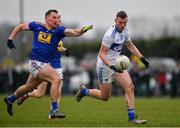 15 January 2022; Cathal Fennessy of Laois in action against Niall Donnelly of Wicklow during the O'Byrne Cup Group B match between Laois and Wicklow at Crettyard GAA Club in Laois. Photo by Daire Brennan/Sportsfile