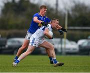 15 January 2022; Paul Kingston of Laois in action against Zach Cullen of Wicklow during the O'Byrne Cup Group B match between Laois and Wicklow at Crettyard GAA Club in Laois. Photo by Daire Brennan/Sportsfile
