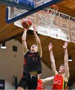 20 January 2022; Aivaras Uosis of Pobailscoil Chorca Dhuibhne in action against Ben Caomhanach of Gaelcholáiste Cheatharlach during the Pinergy Basketball Ireland U19 C Boys Schools Cup Final match between Gaelcholaiste Cheatharlach, Carlow, and Pobailscoil Chorca Dhuibhne, Dingle, Kerry, at the National Basketball Arena in Dublin. Photo by Harry Murphy/Sportsfile