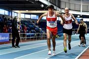 30 January 2022; Athletes from Galway City Harriers AC, pass the baton whilst competing in the Master's Men 4x200m relay during the Irish Life Health National Masters Indoor Championships at TUS International Arena in Athlone, Westmeath. Photo by Sam Barnes/Sportsfile