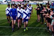 3 February 2022; St Andrews College players leave the pitch to a guard of honour from the St Patricks Classical School players after their defeat in the Bank of Ireland Father Godfrey Cup 2nd Round match between St Andrews College, Dublin, and St Patricks Classical School, Navan at Energia Park in Dublin. Photo by Ben McShane/Sportsfile