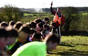 6 February 2022; Race starter Eamonn O'Donnell starts the intermediate boys event during the Irish Life Health Connacht Schools Cross Country at Bushfield in Loughrea, Galway. Photo by Ben McShane/Sportsfile
