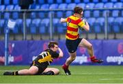 10 February 2022; Donnacha Gleeson of Temple Carrig evades the tackle of Ciaran Scott of St Patrick's Classical School Navan during the Bank of Ireland Fr Godfrey Cup Semi-Final match between Temple Carrig and St Patrick's Classical School Navan at Energia Park in Dublin. Photo by Piaras Ó Mídheach/Sportsfile