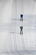 11 February 2022; Thomas Maloney Westgaard of Ireland leads Vitakiy Pukhkalo of Kazakhstan during the Men's 15km Classic event on day seven of the Beijing 2022 Winter Olympic Games at National Cross Country Skiing Centre in Zhangjiakou, China. Photo by Ramsey Cardy/Sportsfile