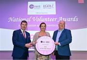 11 February 2022; Élena Byrne from Kilkenny is presented with the PRO of the Year award by Ladies Gaelic Football Association President Mícheál Naughton and Mr Seamus Newcombe, chief executive officer of currentaccount.ie, right, during the 2021 LGFA National Volunteer of the Year awards, in association with currentaccount.ie, at Croke Park in Dublin. Photo by Piaras Ó Mídheach/Sportsfile