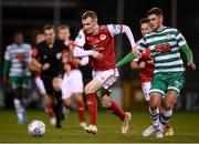 11 February 2022; Mark Doyle of St Patrick's Athletic in action against Dylan Watts of Shamrock Rovers during the FAI President's Cup match between Shamrock Rovers and St Patrick's Athletic at Tallaght Stadium in Dublin. Photo by Stephen McCarthy/Sportsfile