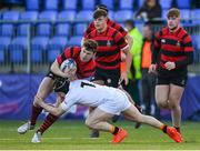 14 February 2022; Sean Naughton of Kilkenny College is tackled by Sam Nolan of Presentation College during the Bank of Ireland Leinster Rugby Schools Senior Cup 1st Round match between Kilkenny College and Presentation College, Bray at Energia Park in Dublin. Photo by Harry Murphy/Sportsfile