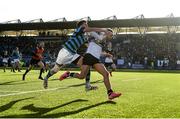 16 February 2022; Ciarán Mangan of Newbridge College on his way to scoring his side's second try despite the tackle of Ciaran Foley of St Gerard’s School during the Bank of Ireland Leinster Rugby Schools Senior Cup 1st Round match between St Gerard's School, Dublin and Newbridge College, Kildare at Energia Park in Dublin. Photo by Harry Murphy/Sportsfile