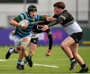 16 February 2022; Tim Wilkinson of St Gerard’s School is tackled by Finn Mahon of Newbridge College during the Bank of Ireland Leinster Rugby Schools Senior Cup 1st Round match between St Gerard's School, Dublin and Newbridge College, Kildare at Energia Park in Dublin. Photo by Harry Murphy/Sportsfile