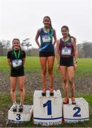 16 February 2022; Senior girls' 1500m medallists, Eimear Maher of Mount Anville, gold, Emma McEvoy of Loreto Stephens Green, silver, and Meabh Eakin of Ballymakenny College, bronze, during the Irish Life Health Leinster Schools Cross Country Championships at Santry Demesne in Dublin. Photo by Sam Barnes/Sportsfile